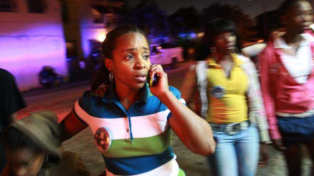 Tangela Johnson, mother of Derrick Gloster, 18, who was shot and killed in 2009 in Liberty City, walks from house to house appealing for help from the community in hopes of finding her son’s killer, Jan 28, 2009.